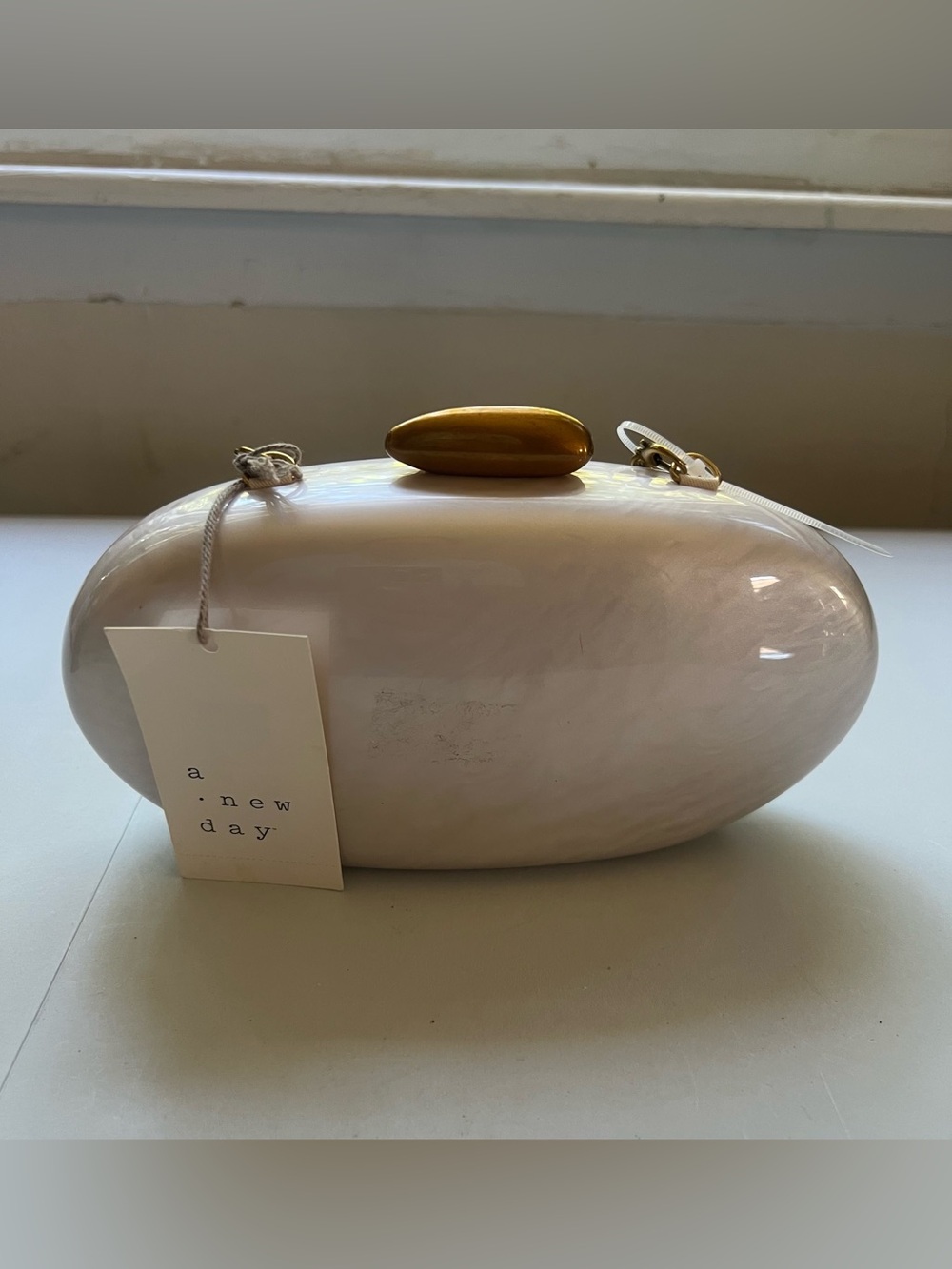 a new day Iridescent Pearl Pink Oval Clutch with Gold Accent